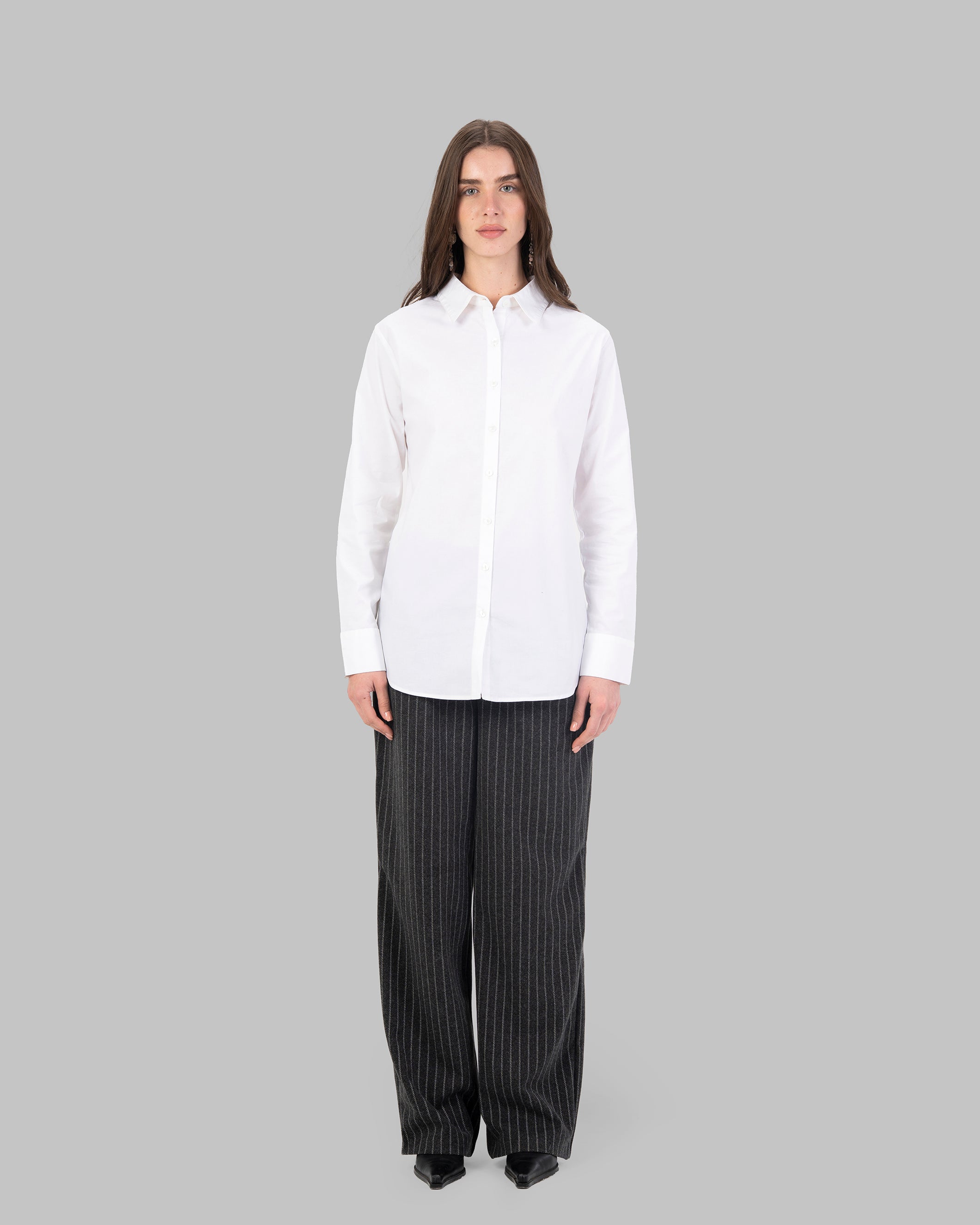 Oversize white collared shirt.