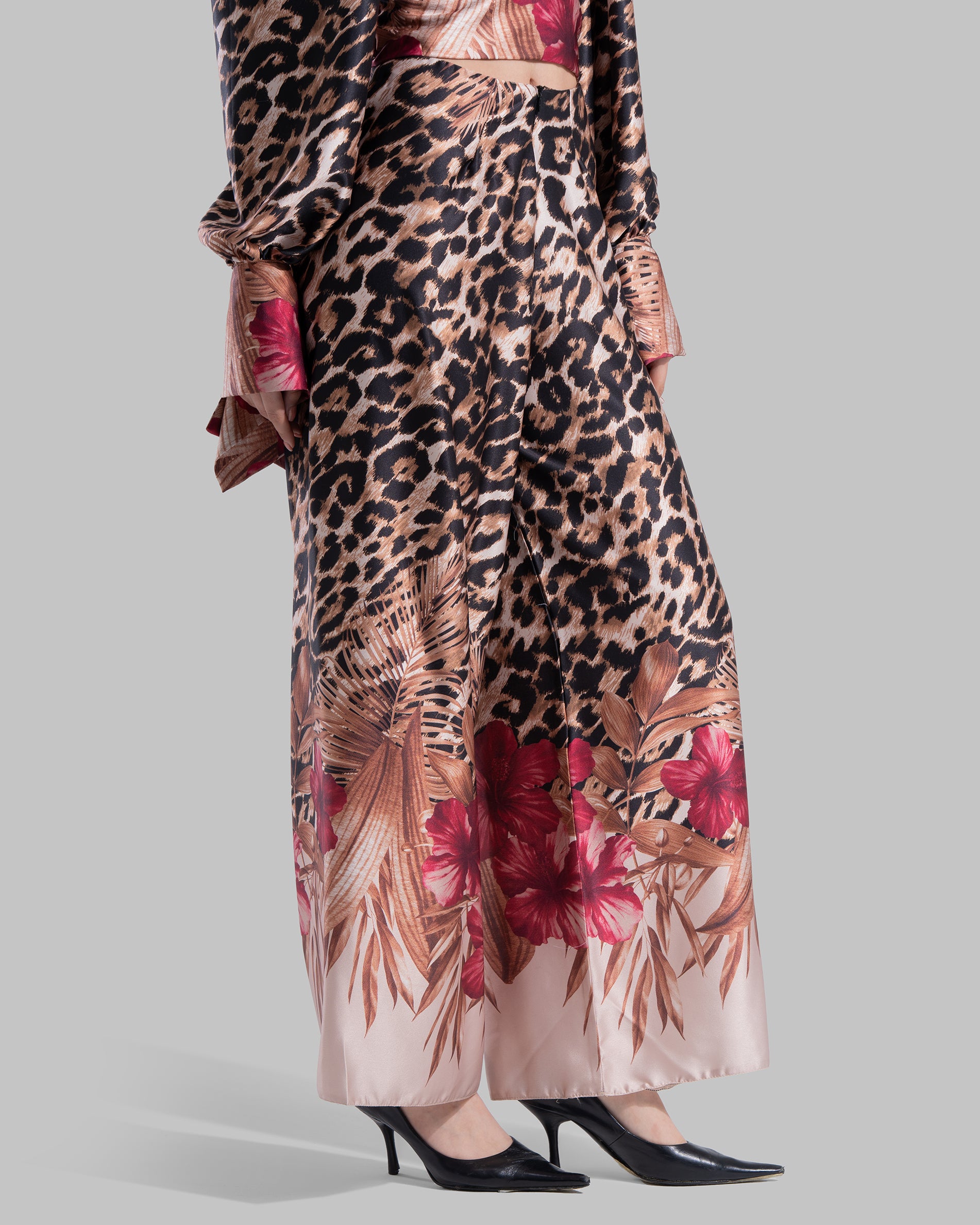 High-waisted pants featuring a bold leopard print.