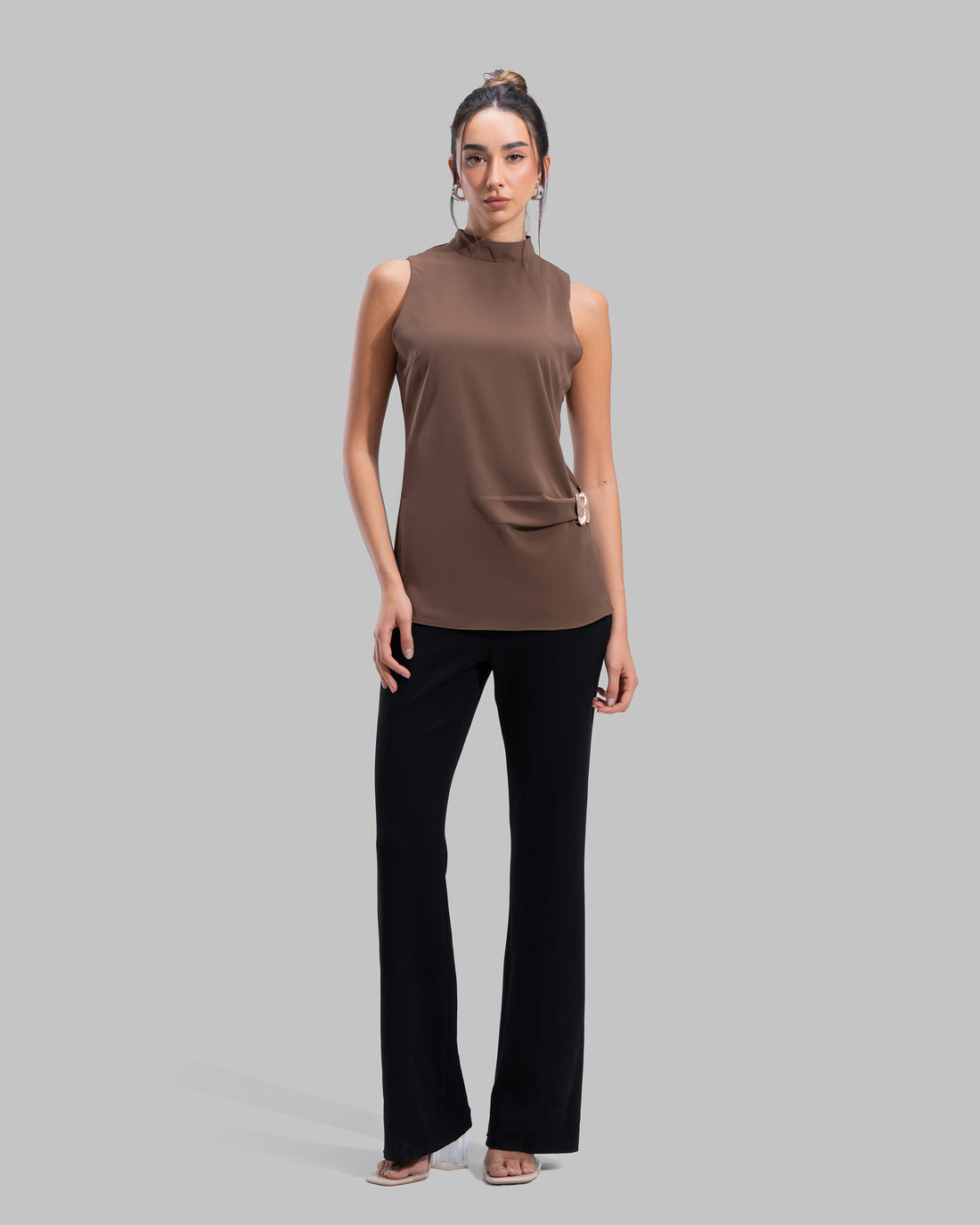 Sleeveless ribbed tank top with a metallic thread finish and a round neck.