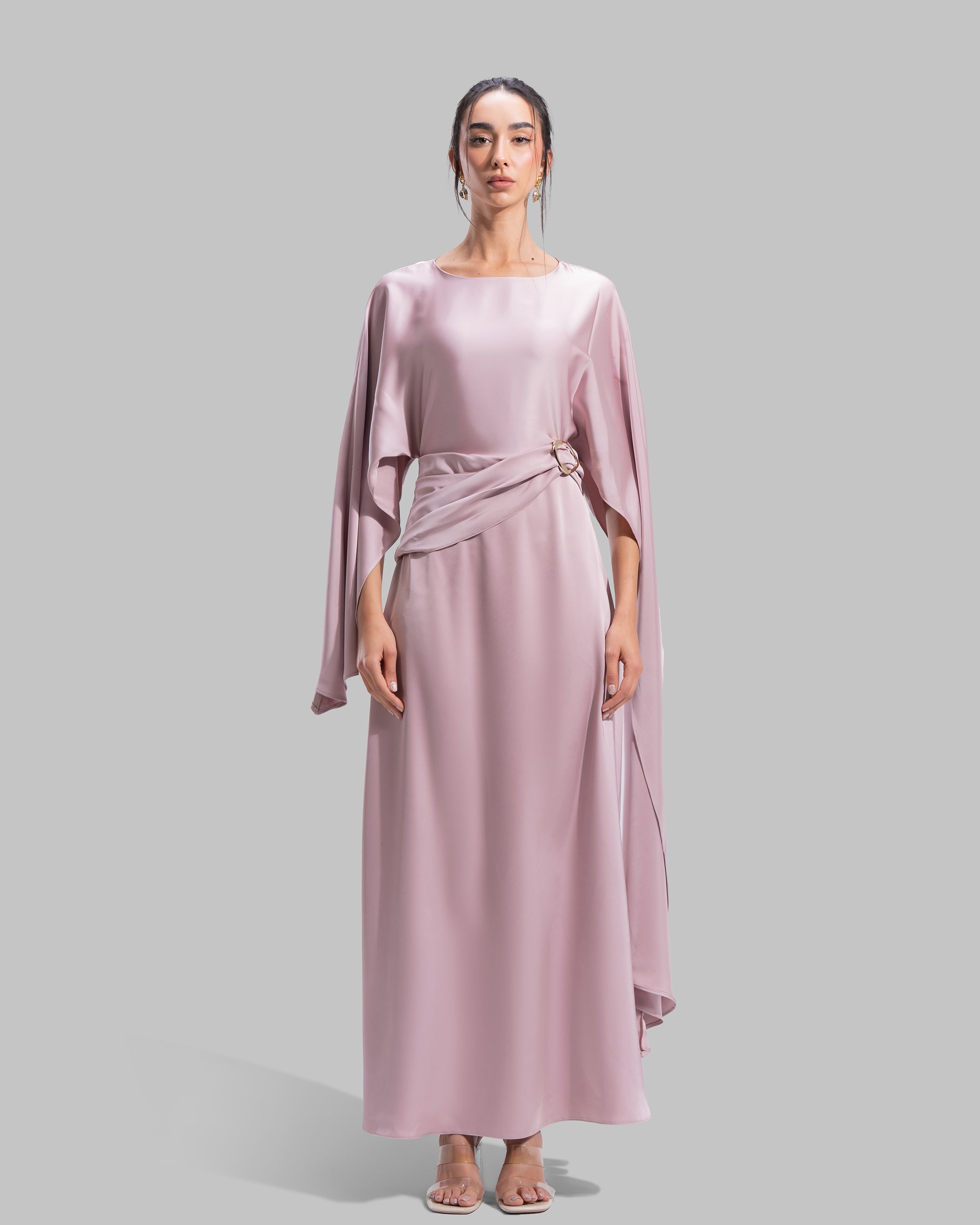An elegant satin gown of sweeping length