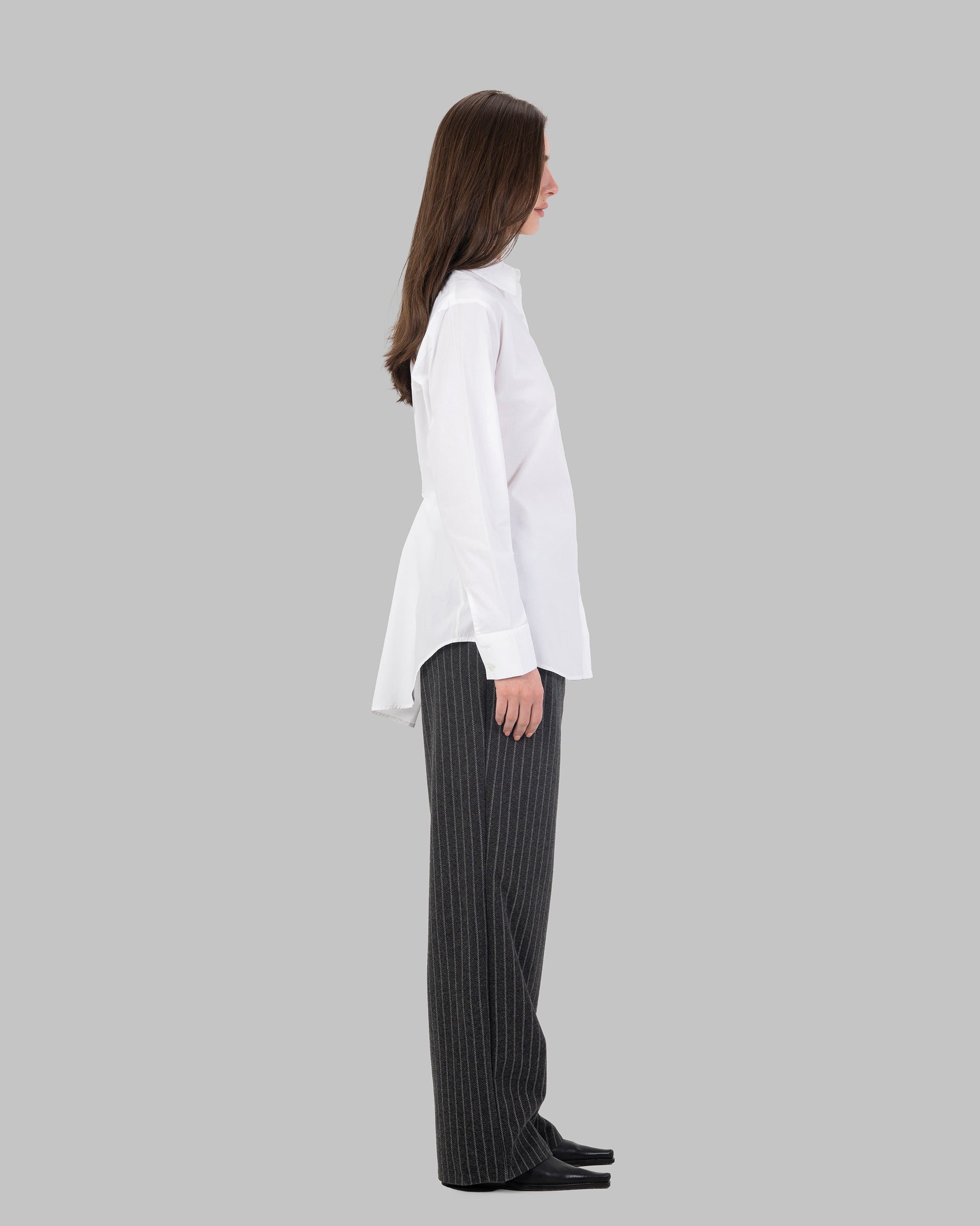 Oversize white collared shirt.