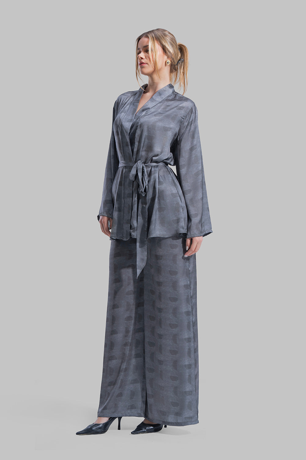 Long sleeve Cardigan with a wrap-style front.