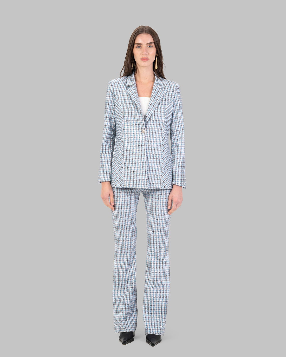 Houndstooth Tailored Blazer. Elegant tailored blazer in a soft houndstooth fabric.
