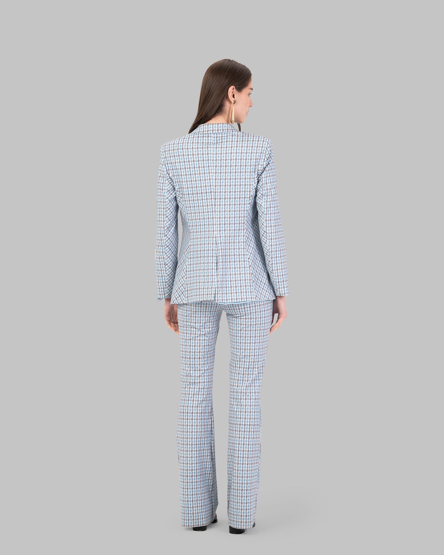 Houndstooth Tailored Blazer. Elegant tailored blazer in a soft houndstooth fabric.