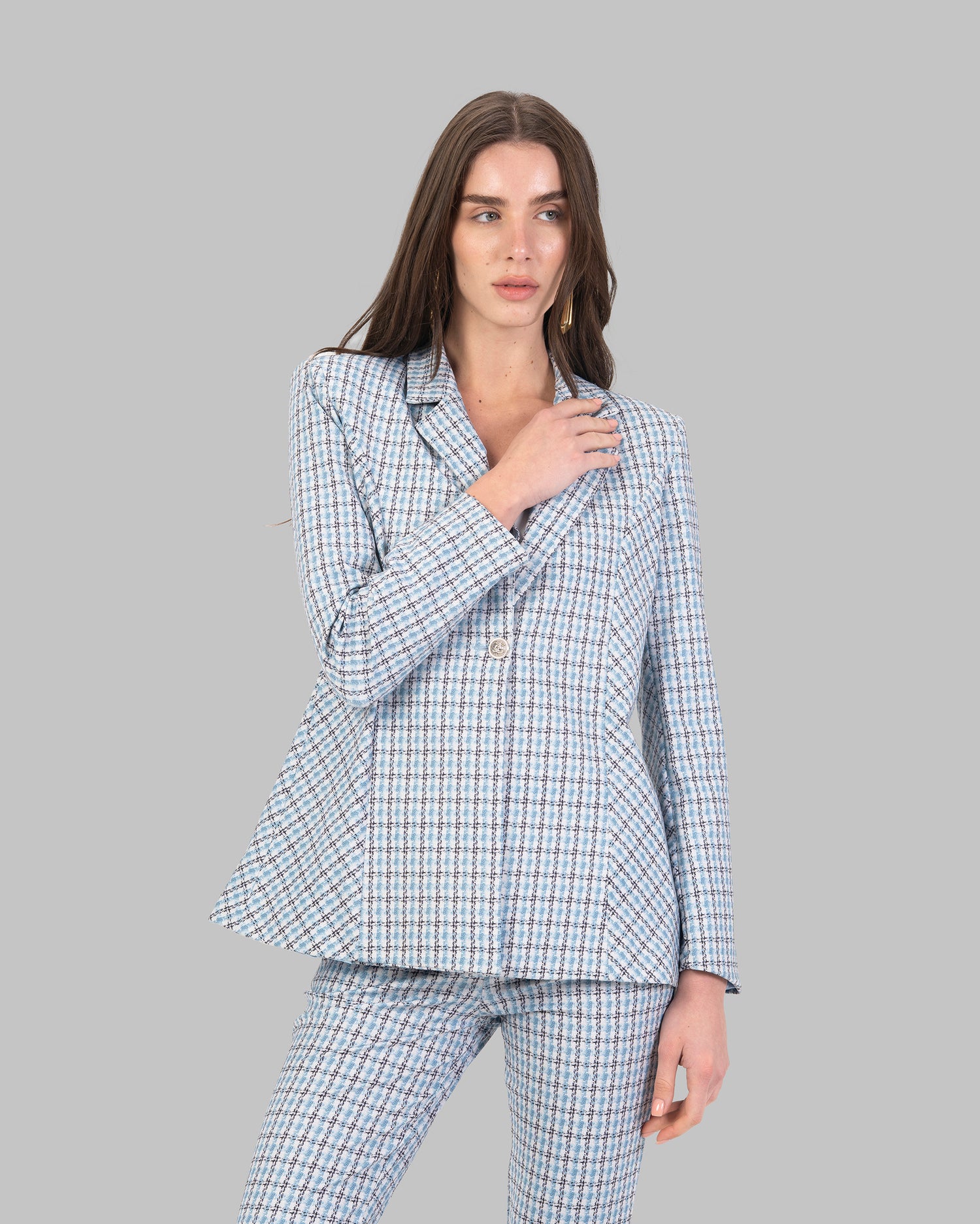 Houndstooth Tailored Blazer. Elegant tailored blazer in a soft houndstooth fabric.