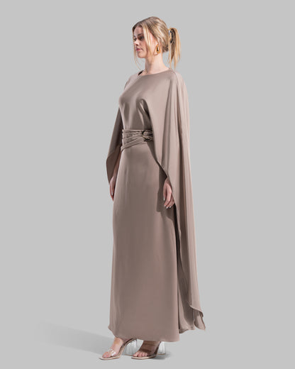An elegant satin gown of sweeping length