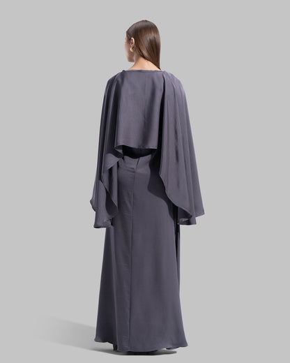 Long dress made of a flowing satin-finish fabric.