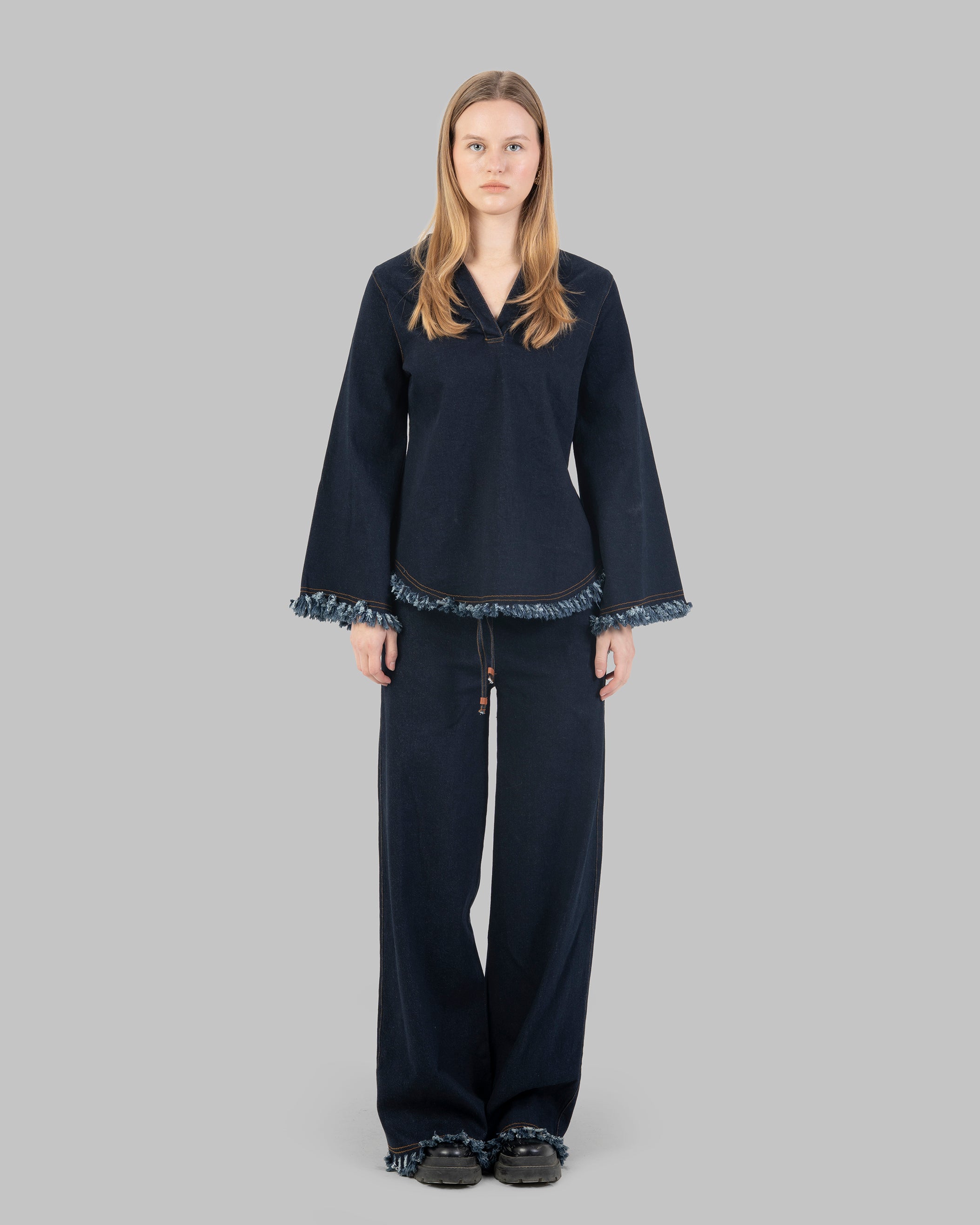 بنطلون جينز واسع الساق