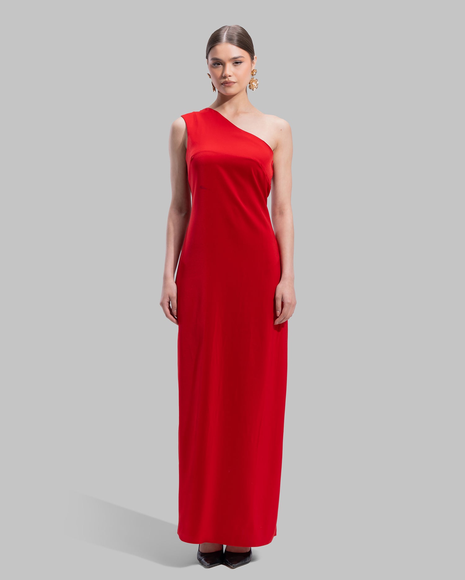 Draped asymmetrical neckline satin maxi dress with a fluid oversized silhouette.