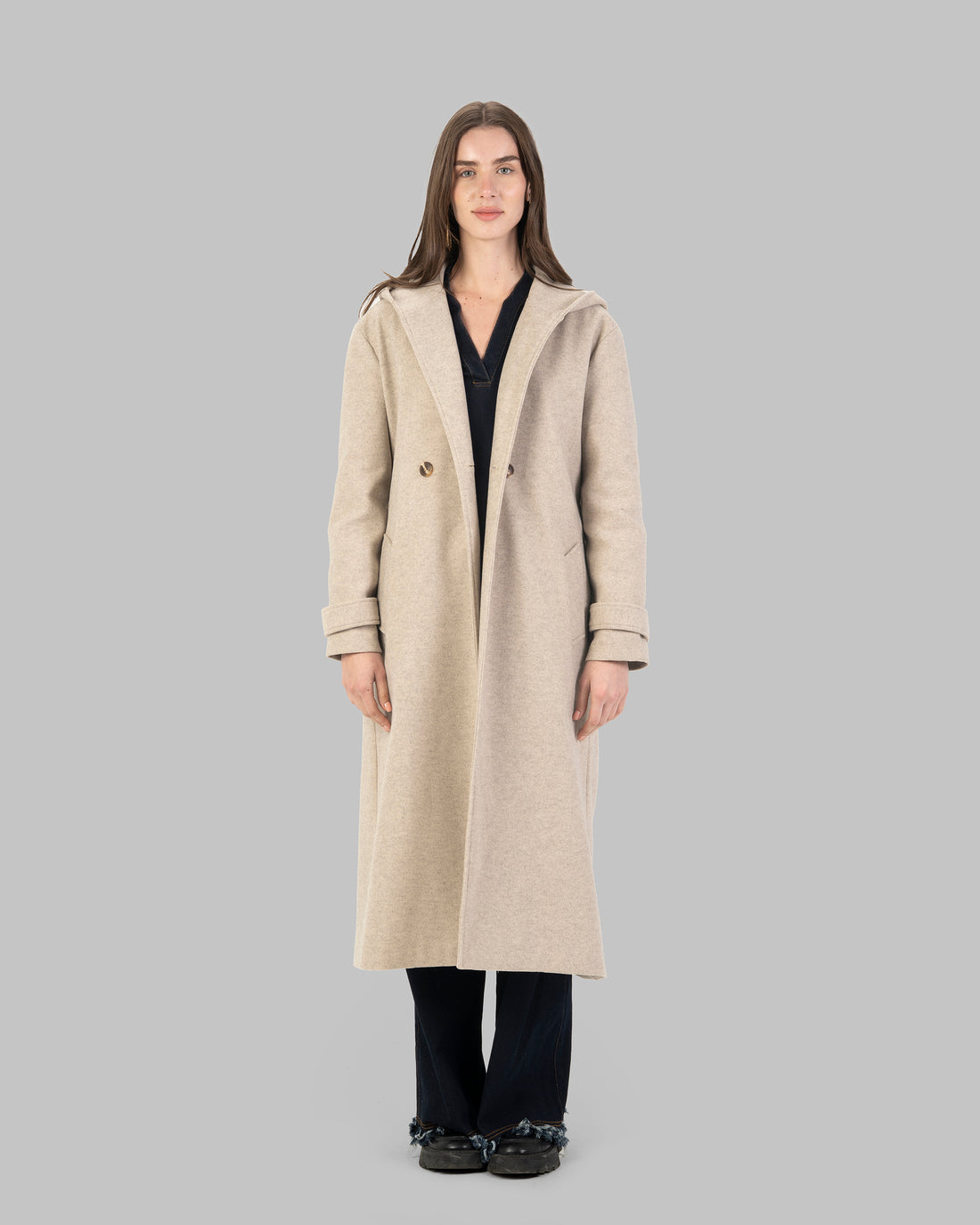 Long hooded coat in light beige with a belt waist