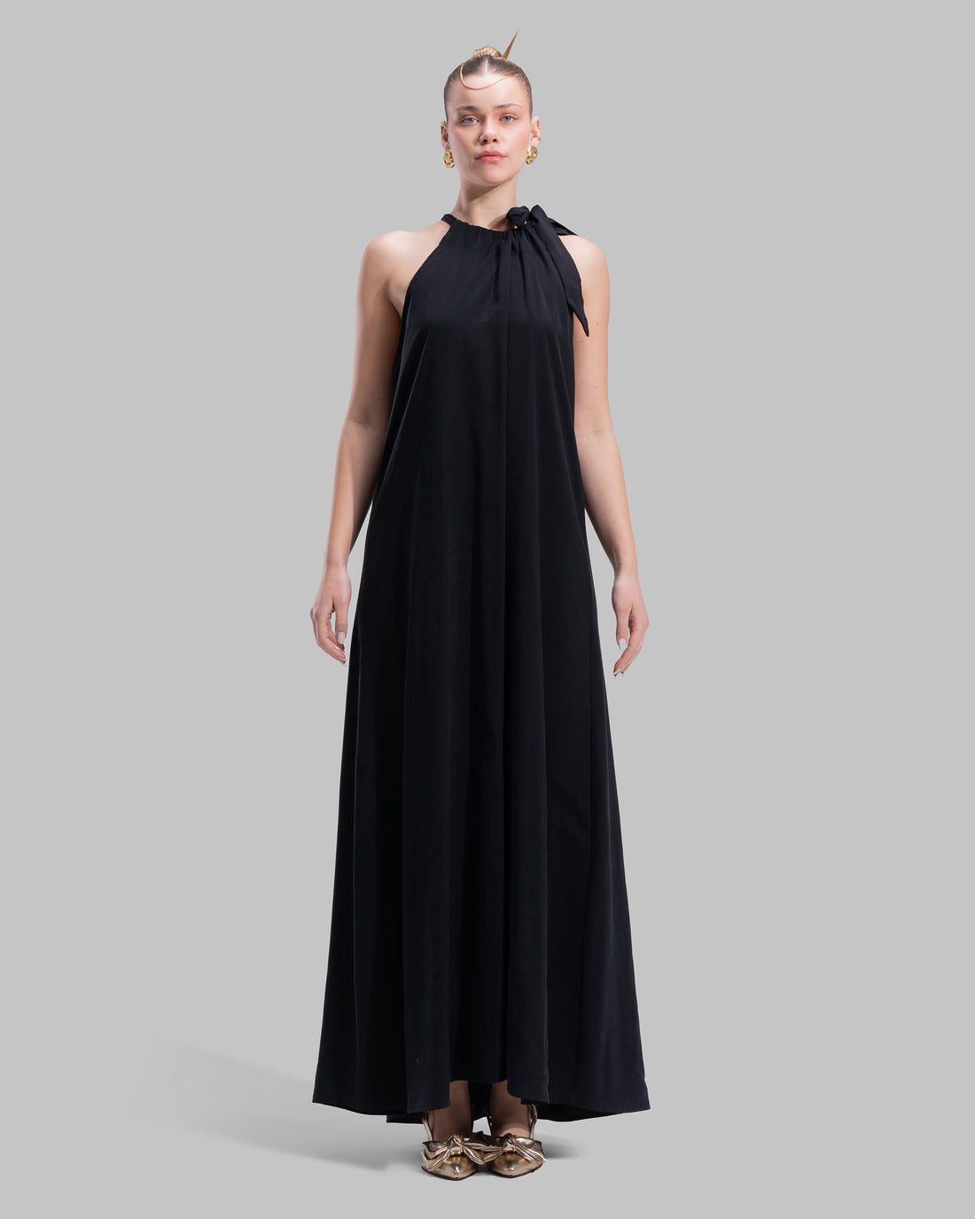 Long dress with a halter neckline.