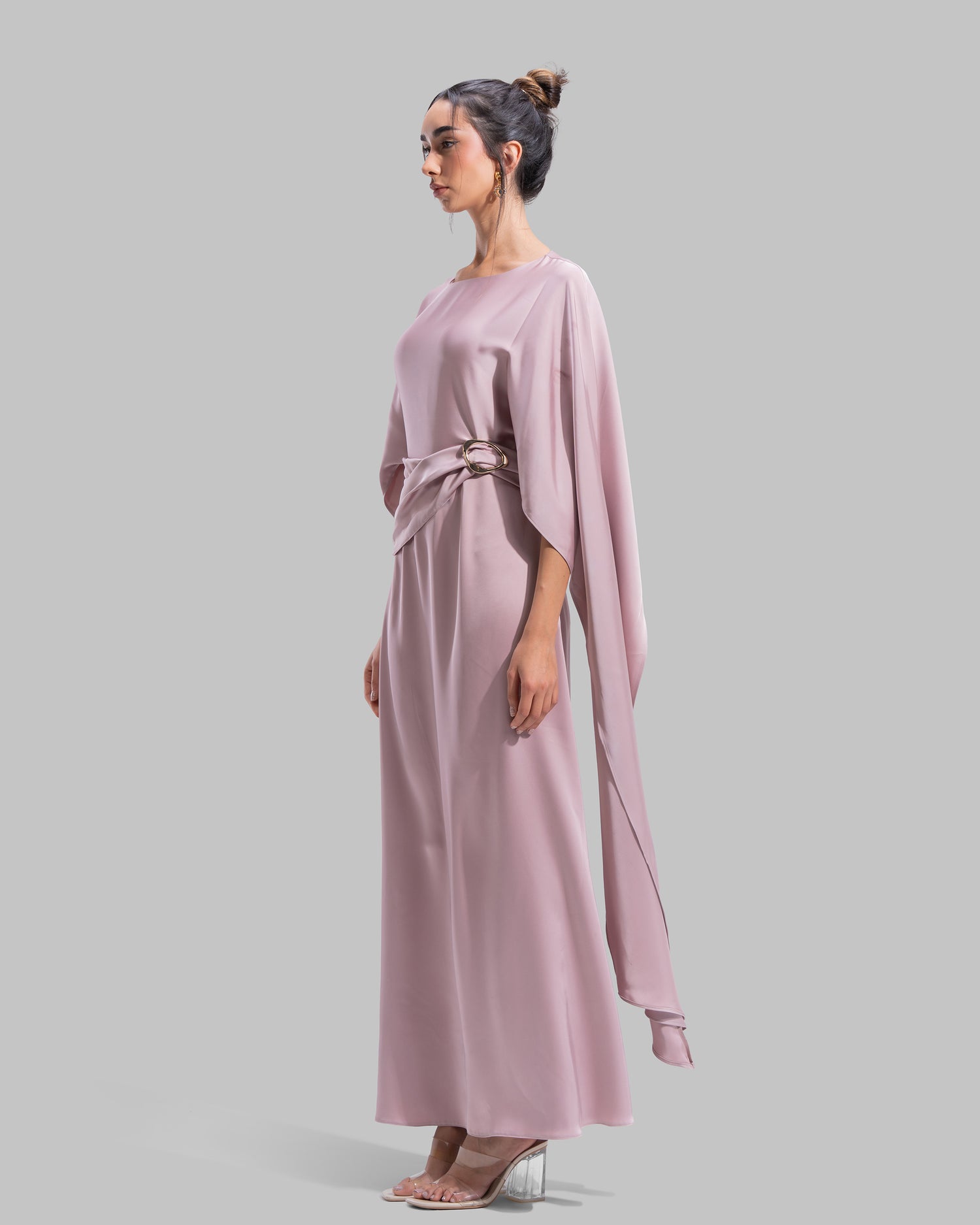 An elegant satin gown of sweeping length