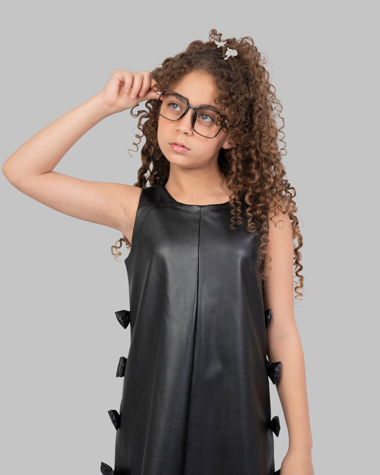 Leather Pinafore Dress with Side Bow Details.