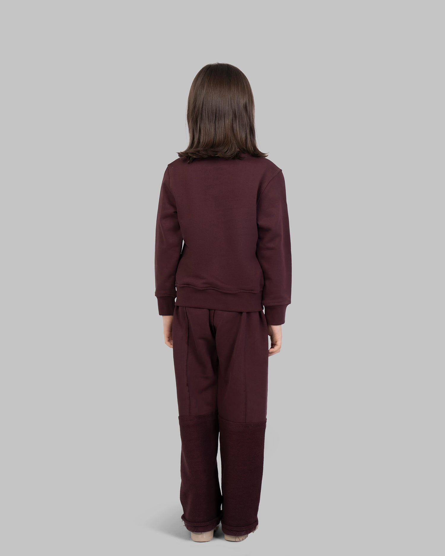 sweatshirt with small, scattered gold flowers on the front.