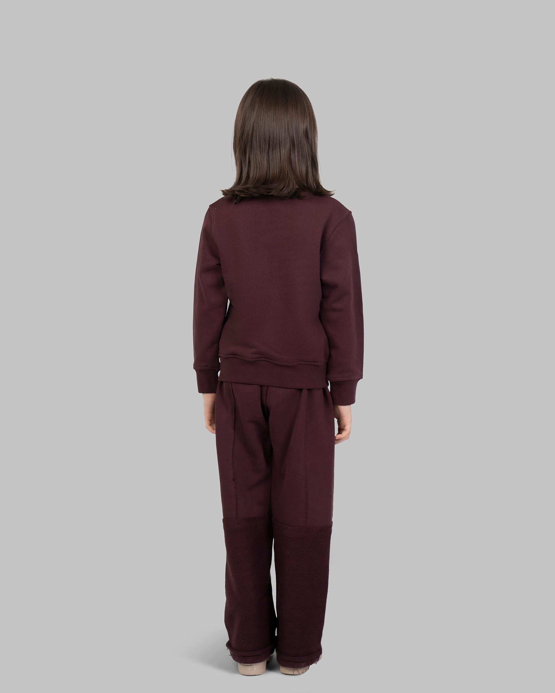 sweatshirt with small, scattered gold flowers on the front.