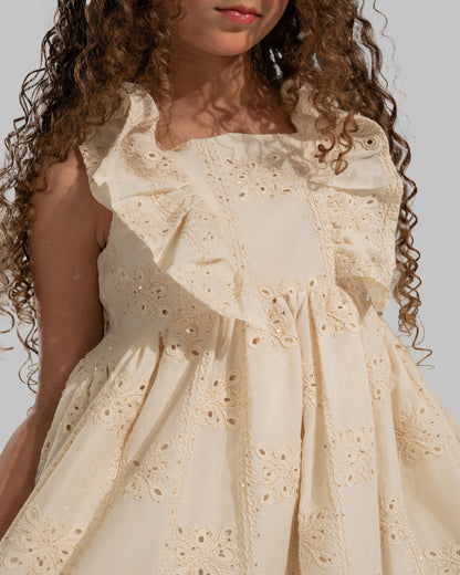 Embroidered sleeveless dress with a square neckline and ruffle details on the straps