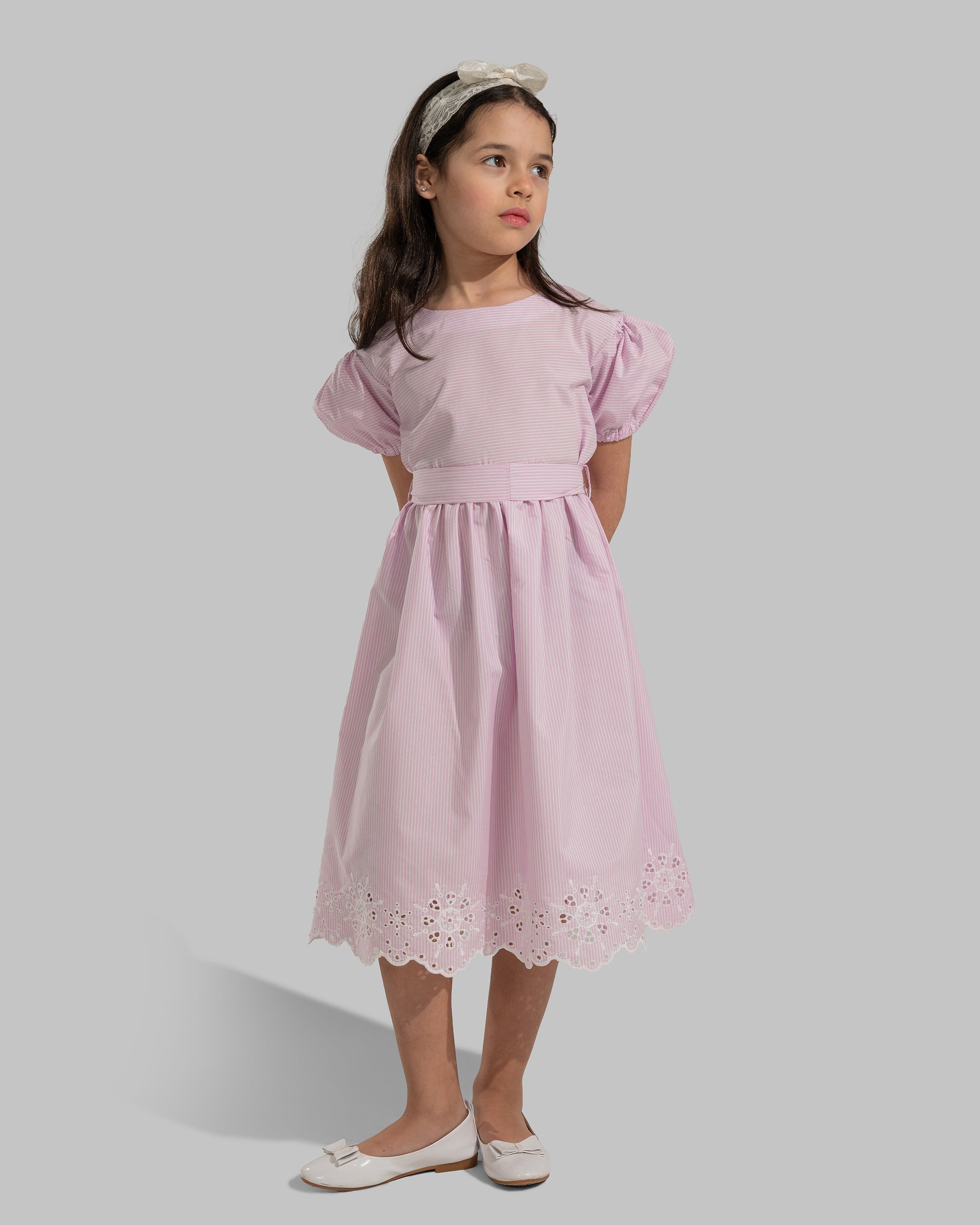 Striped puff-sleeve dress with a matching tie belt.