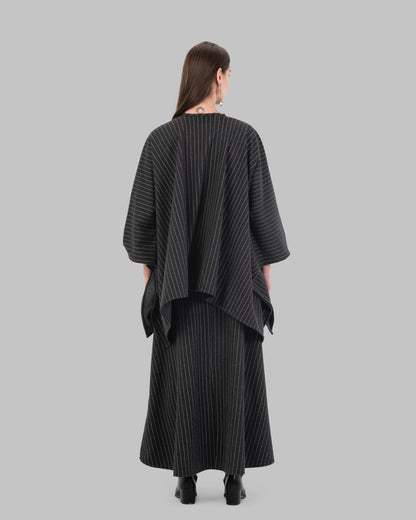 pinstripe poncho with a V-neck and an asymmetric hem.